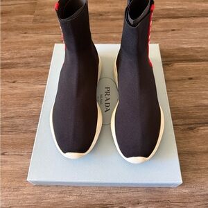 Prada Black Stretch Sock Sneakers with Red Heel Detail